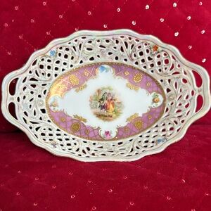 This is a Schumann Arzberg Bavaria reticulated porcelain oval dish.